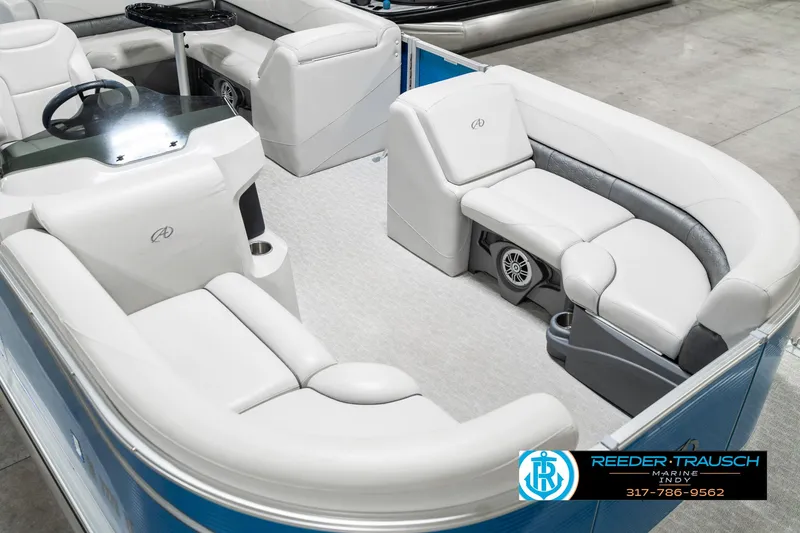 Slide: The Image of 2025 Avalon 2285 LSZ CRB pontoon boat interior with plush seating and modern design. - 13