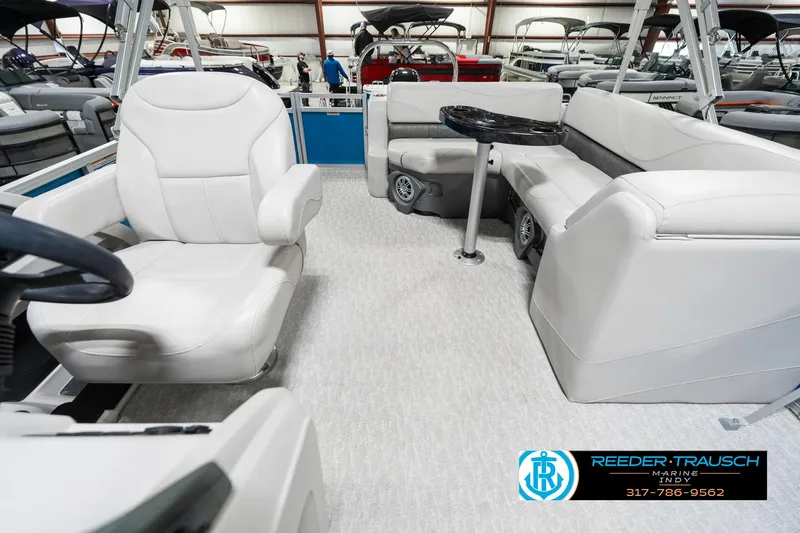 Slide: The Image of 2025 Avalon 2285 LSZ CRB boat interior with plush seating and modern design. - 17
