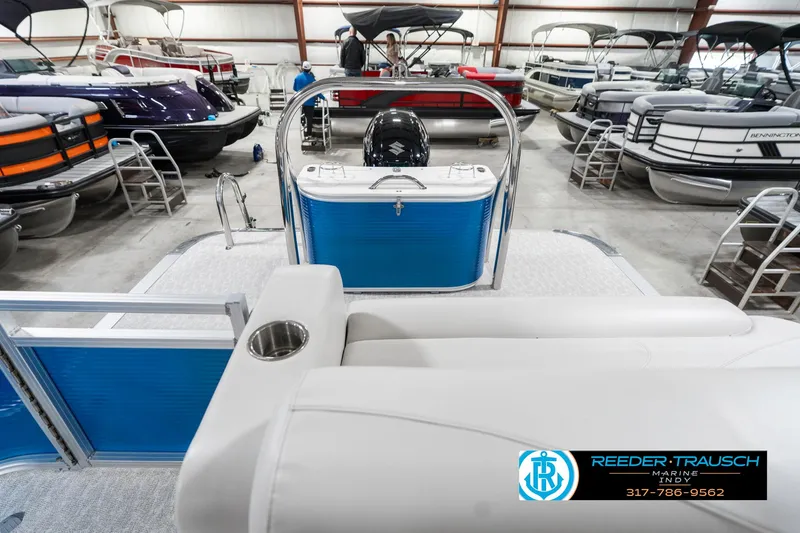 Slide: The Image of 2025 Avalon 2285 LSZ CRB pontoon boat in showroom with other boats. - 18