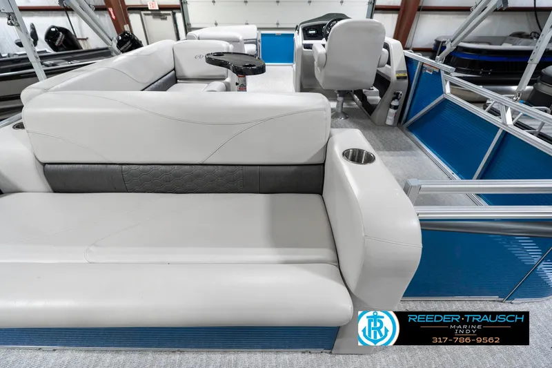 Slide: The Image of 2025 Avalon 2285 LSZ CRB pontoon boat interior with plush seating and modern design. - 19