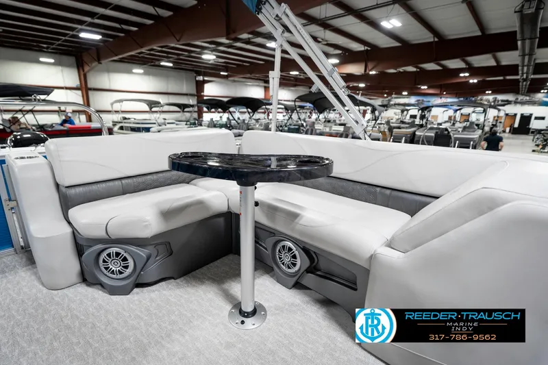 Slide: The Image of 2025 Avalon 2285 LSZ CRB pontoon boat interior with seating and table. - 25