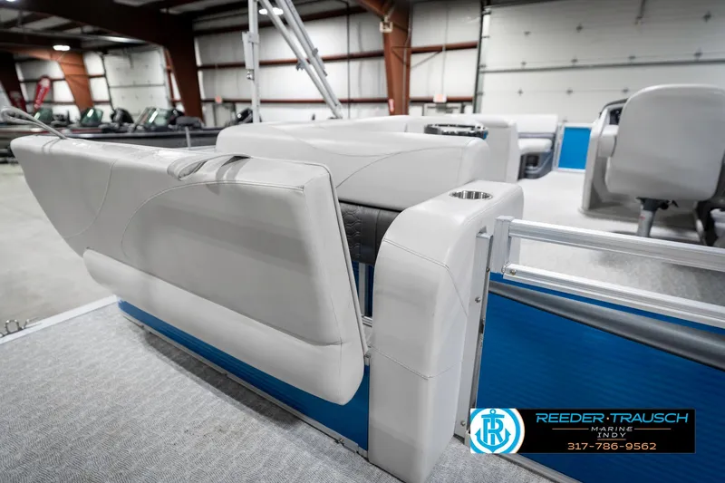 Slide: The Image of 2025 Avalon 2285 LSZ CRB pontoon boat interior with gray seating in a showroom. - 30