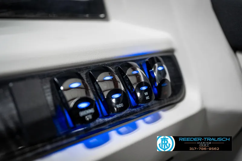Slide: The Image of Control panel with illuminated switches on 2025 Avalon 2285 LSZ CRB boat. - 39