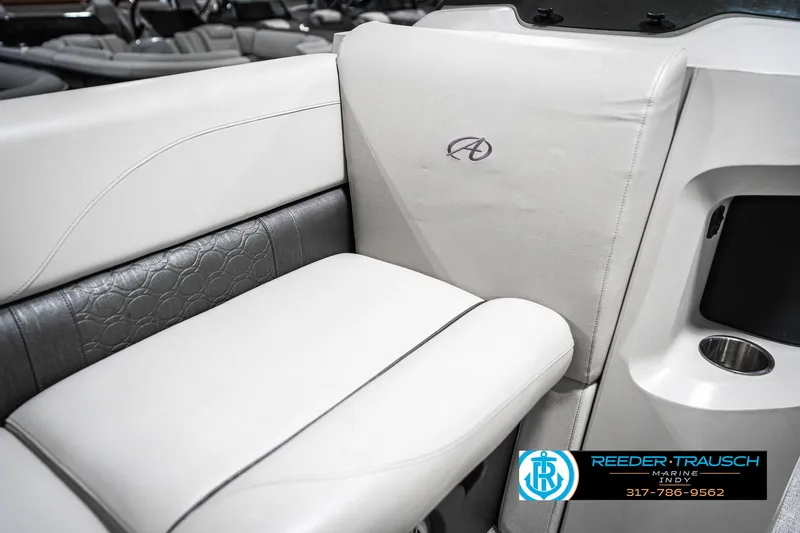 Slide: The Image of 2025 Avalon 2285 LSZ CRB boat interior with white and gray seating. - 41