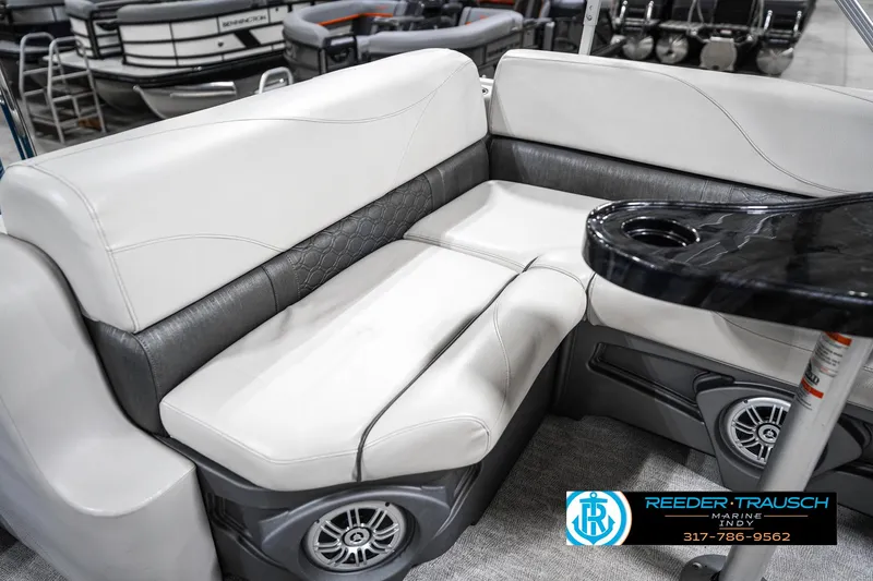 Slide: The Image of Luxurious seating in 2025 Avalon 2285 LSZ CRB pontoon boat with integrated speakers. - 42