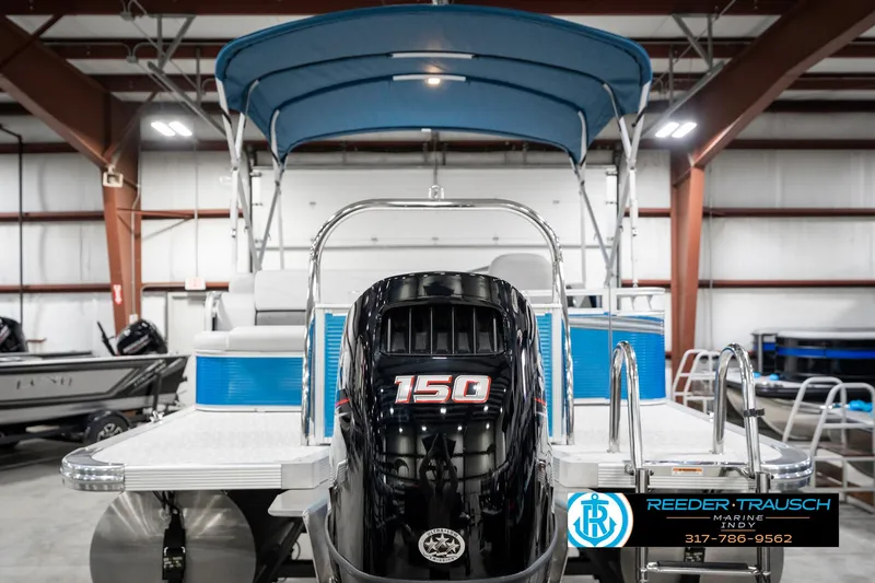 Slide: The Image of 2025 Avalon 2285 LSZ CRB pontoon boat with 150 HP engine in showroom. - 9