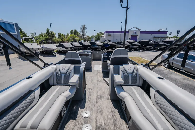 Slide: The Image of Interior view of a 2021 Godfrey Sanpan 2400 ULC pontoon boat with luxurious seating. - 14