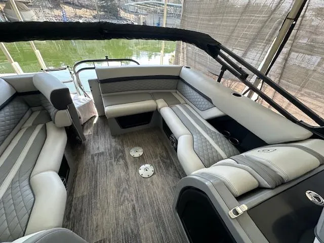 Slide: The Image of Luxurious interior of 2021 Godfrey Sanpan 2400 ULC pontoon boat with plush seating. - 4
