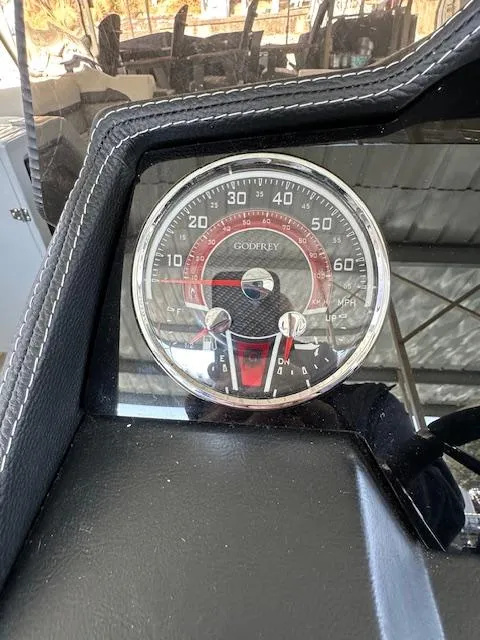 Slide: The Image of Speedometer of 2021 Godfrey Sanpan 2400 ULC boat, showing speed in miles per hour. - 9