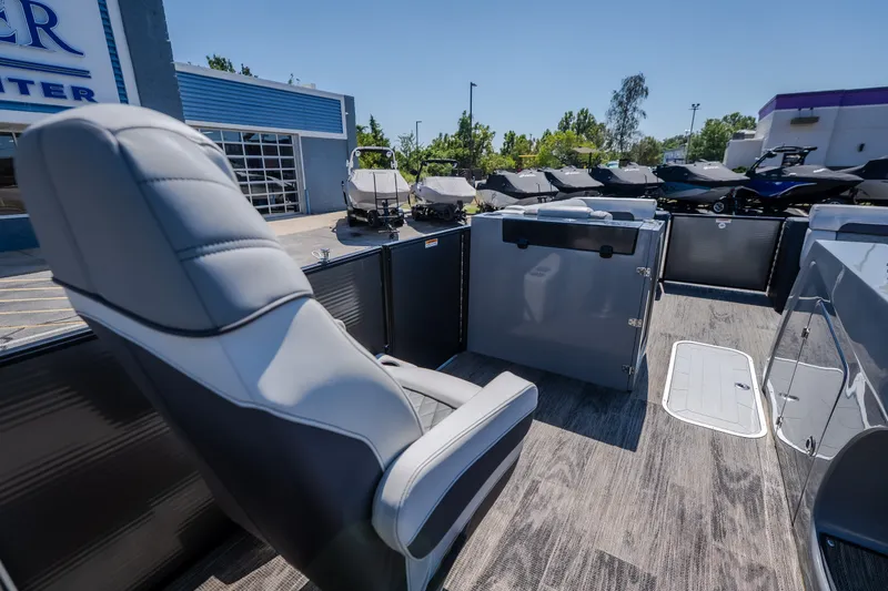 Slide: The Image of Interior view of a 2021 Godfrey Sanpan 2400 ULC pontoon boat at a dealership. - 20