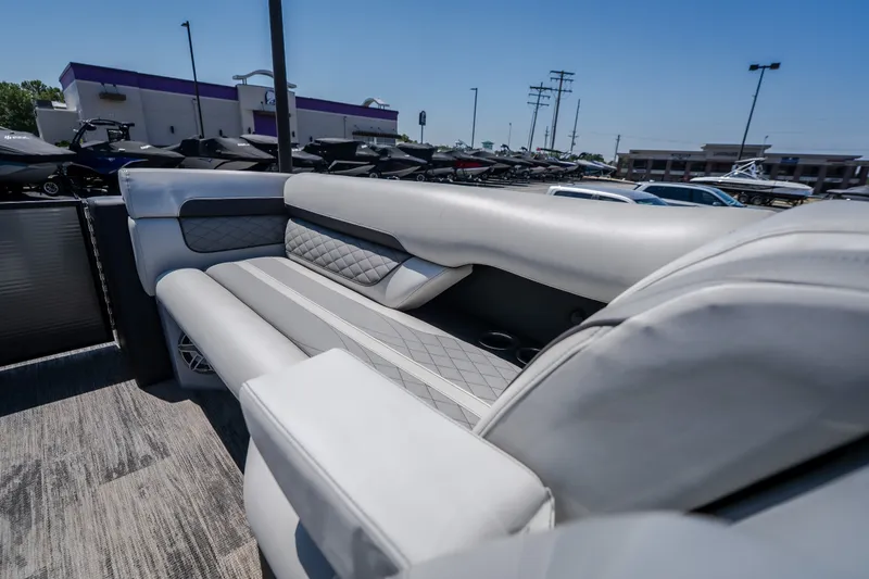 Slide: The Image of Luxurious seating on 2021 Godfrey Sanpan 2400 ULC pontoon boat, showcasing elegant design. - 24