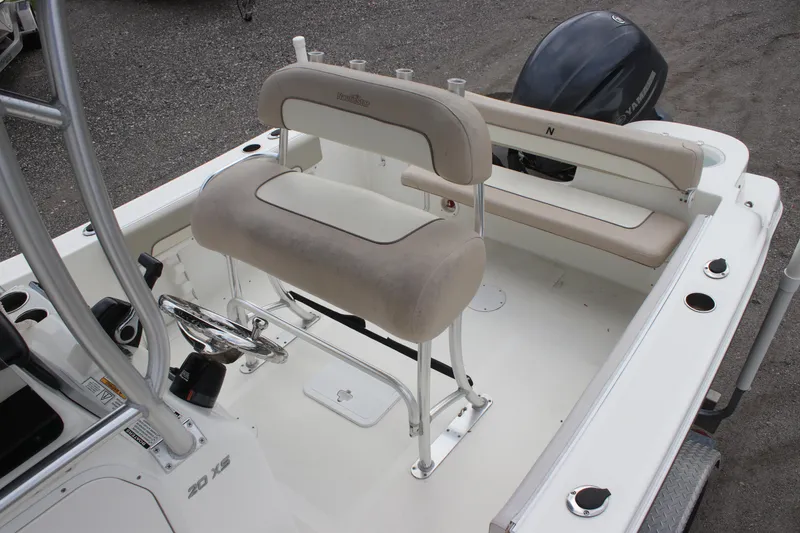 Slide: The Image of 2016 NauticStar 20 XS Offshore boat interior with seating and controls. - 11