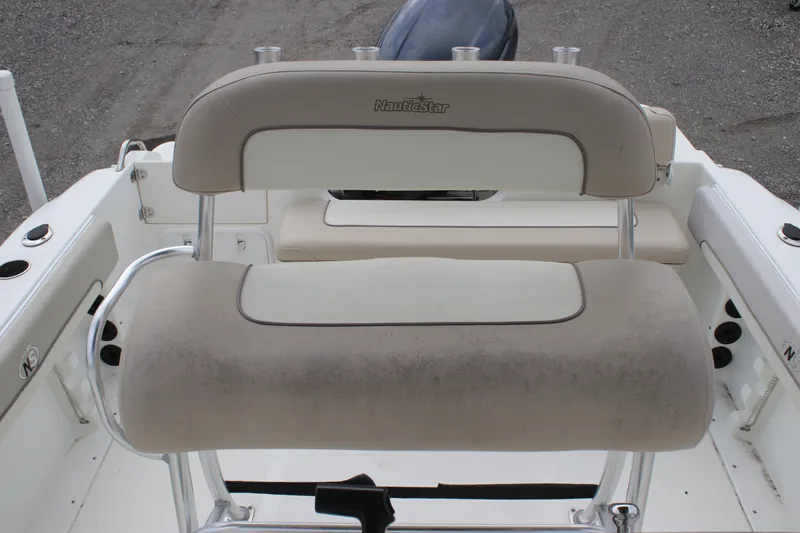 Slide: The Image of 2016 NauticStar 20 XS Offshore boat seating with cushioned backrest. - 12