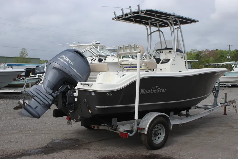 Slide: The Image of 2016 NauticStar 20 XS Offshore boat on trailer with Yamaha outboard motor. - 4