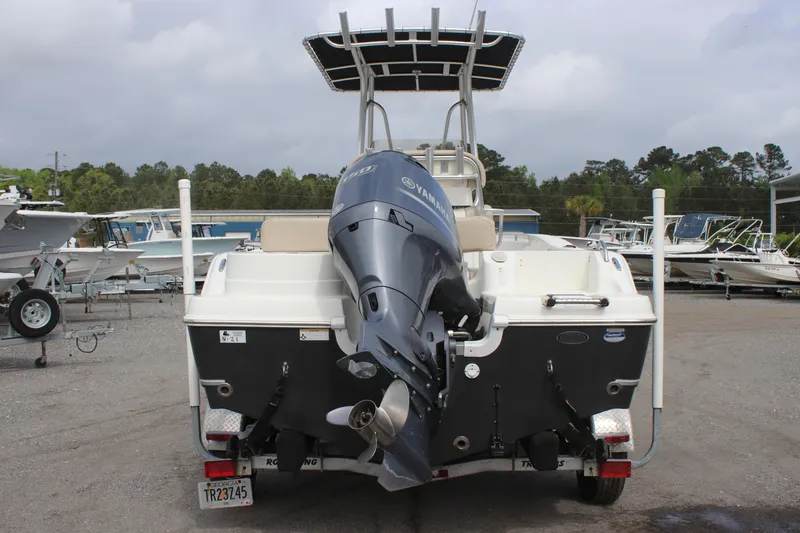 Slide: The Image of 2016 NauticStar 20 XS Offshore boat with outboard motor, rear view. - 5