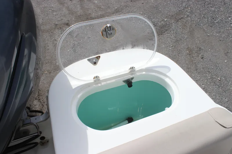 Slide: The Image of Open livewell on 2016 NauticStar 20 XS Offshore boat, showcasing interior. - 8