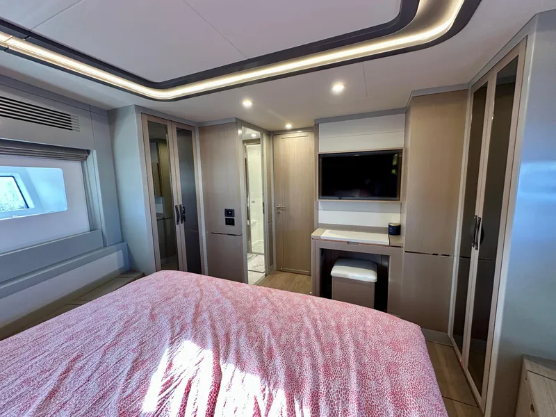 Slide: The Image of Luxurious bedroom interior of 2024 Sirena 68 yacht with modern design and amenities. - 24