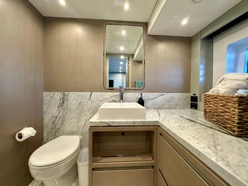 Slide: The Image of Luxurious bathroom in 2024 Sirena 68 yacht with marble countertops and modern fixtures. - 29
