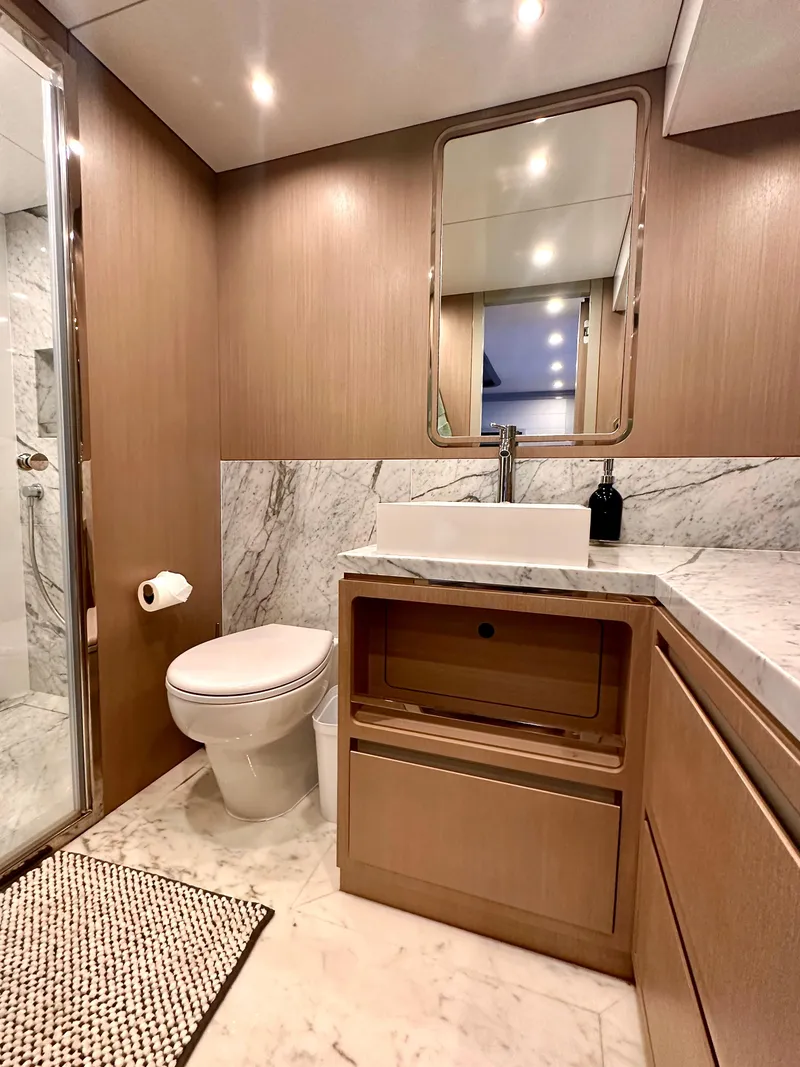 Slide: The Image of Luxurious bathroom in 2024 Sirena 68 yacht with marble accents and modern fixtures. - 32