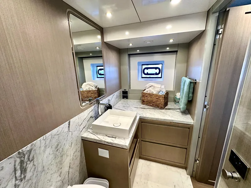 Slide: The Image of Luxurious bathroom in 2024 Sirena 68 yacht with marble countertop and modern fixtures. - 34