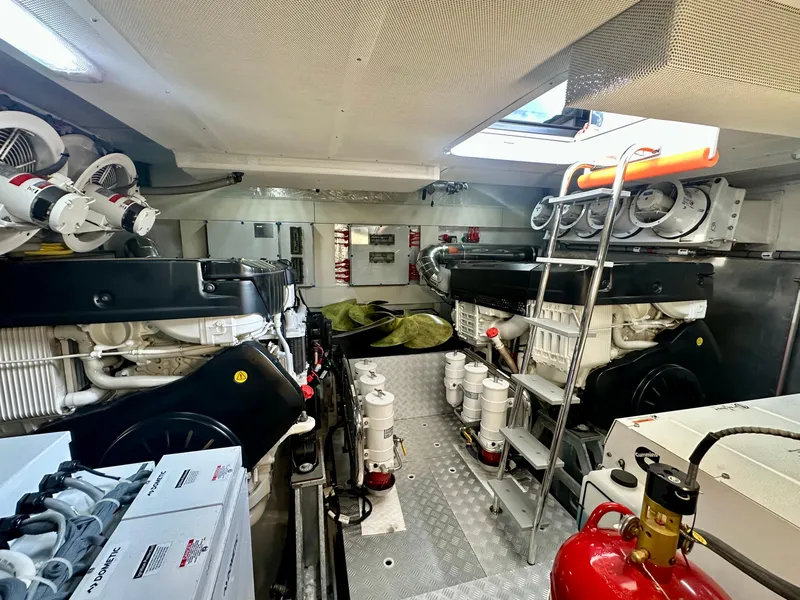 Slide: The Image of Engine room of 2024 Sirena 68 yacht, featuring modern equipment and organized layout. - 42