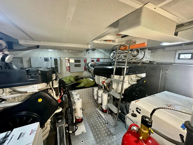 Slide: The Image of Engine room of 2024 Sirena 68 yacht, featuring advanced machinery and equipment. - 43