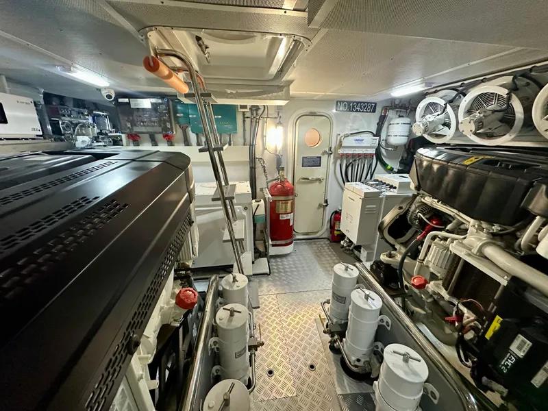 Slide: The Image of Engine room of 2024 Sirena 68 yacht, featuring advanced machinery and equipment. - 44