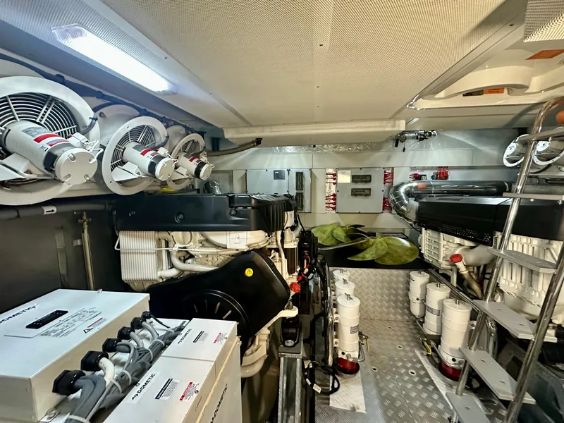 Slide: The Image of Engine room of 2024 Sirena 68 yacht, featuring advanced machinery and ventilation systems. - 47