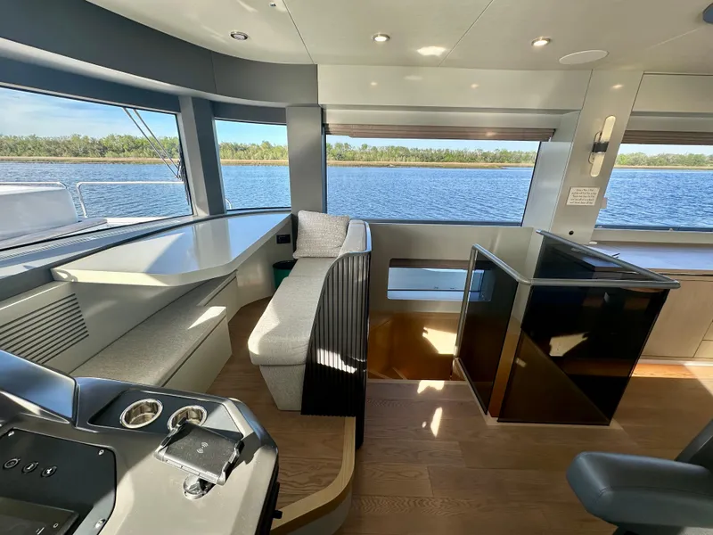 Slide: The Image of Luxurious interior of 2024 Sirena 68 yacht with panoramic water views. - 6