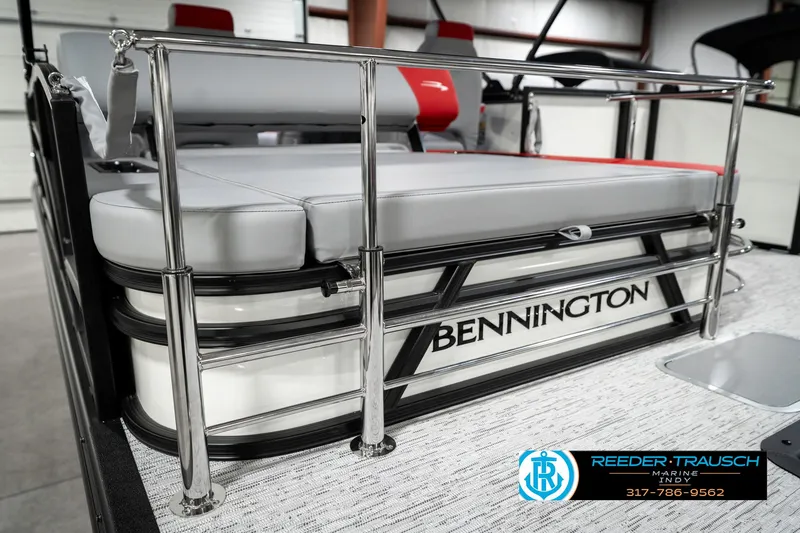 Slide: The Image of 2025 Bennington 21 SSB pontoon boat with sleek design and comfortable seating. - 31