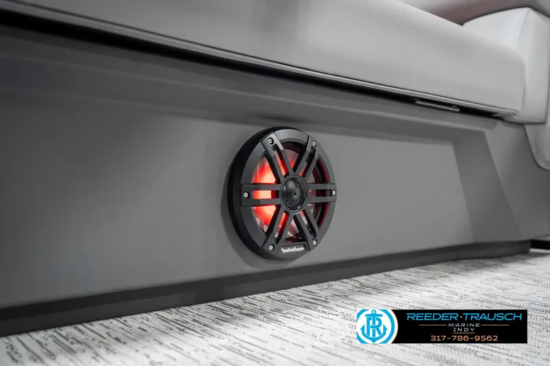 Slide: The Image of 2025 Bennington 21 SSB boat interior with illuminated speaker detail. - 47