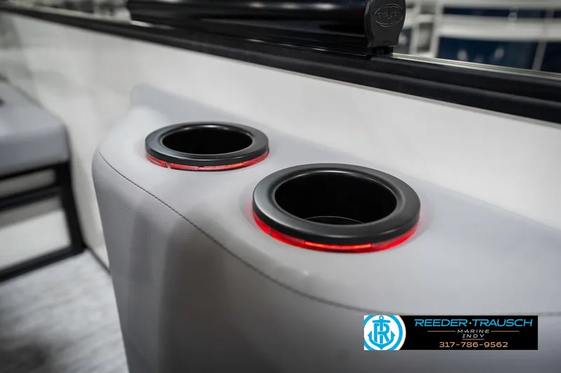 Slide: The Image of 2025 Bennington 21 SSB boat cup holders with red LED lighting. - 48