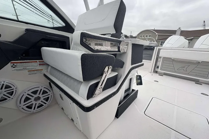 Slide: The Image of 2025 Blackfin 252 DC boat interior with adjustable seating and modern design features. - 18