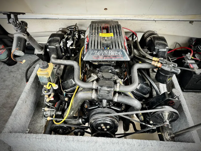 Slide: The Image of Engine of a 1994 Cobalt 222 boat, featuring a 7.4L V8 Bravo motor. - 16