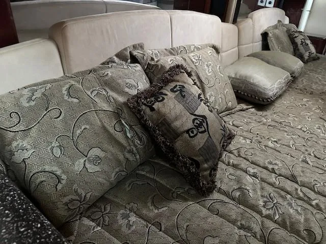 Slide: The Image of Luxurious interior seating with patterned cushions in a 2004 Formula 400 Super Sport boat. - 18