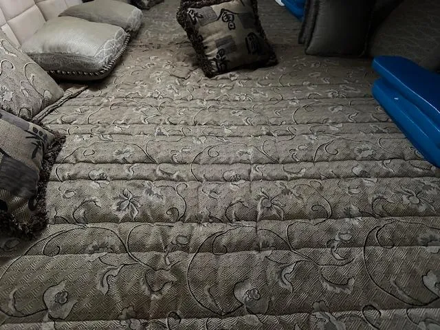 Slide: The Image of Luxurious interior bedding with decorative pillows in a 2004 Formula 400 Super Sport boat. - 19