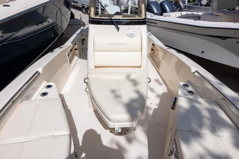 Slide: The Image of 2021 Grady-White 251 Coastal Explorer boat interior with seating and console. - 11
