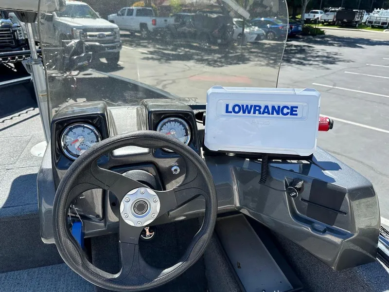 Slide: The Image of 2020 Tracker Pro Guide V-16 SC boat dashboard with Lowrance navigation system. - 11