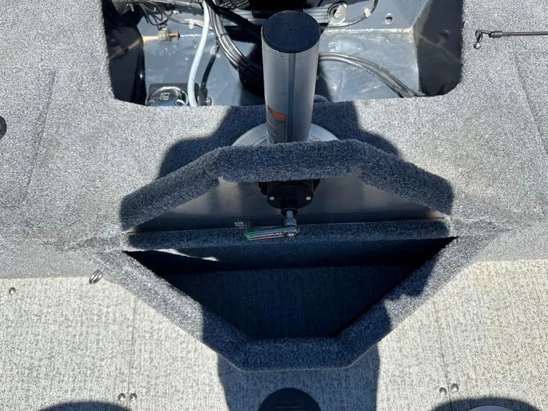 Slide: The Image of 2020 Tracker Pro Guide V-16 SC boat interior with storage compartment and pedestal mount. - 25