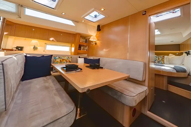 Slide: The Image of Luxurious interior of 2018 Amel 55 yacht with cozy seating and modern design. - 10