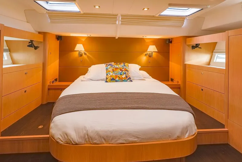 Slide: The Image of Luxurious cabin interior of 2018 Amel 55 yacht with cozy bed and modern lighting. - 21