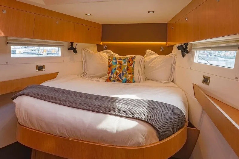Slide: The Image of Luxurious cabin interior of 2018 Amel 55 yacht with cozy bed and modern decor. - 4