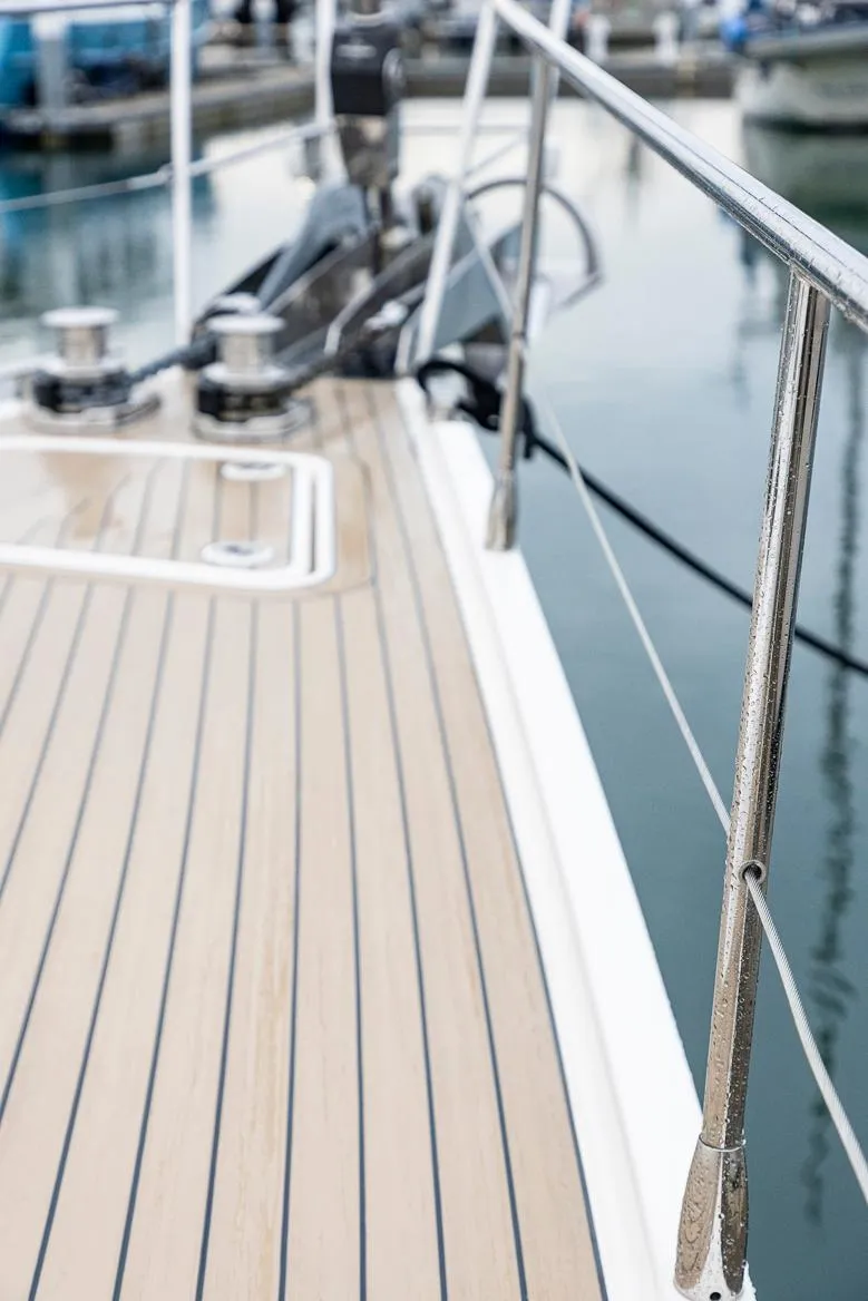 Slide: The Image of Deck view of 2018 Amel 55 yacht, featuring sleek design and polished railings. - 44