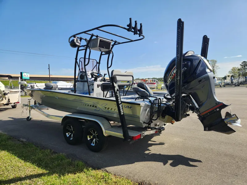 Slide: The Image of 2022 Xpress H22B boat with motor and trailer in a parking lot. - 4