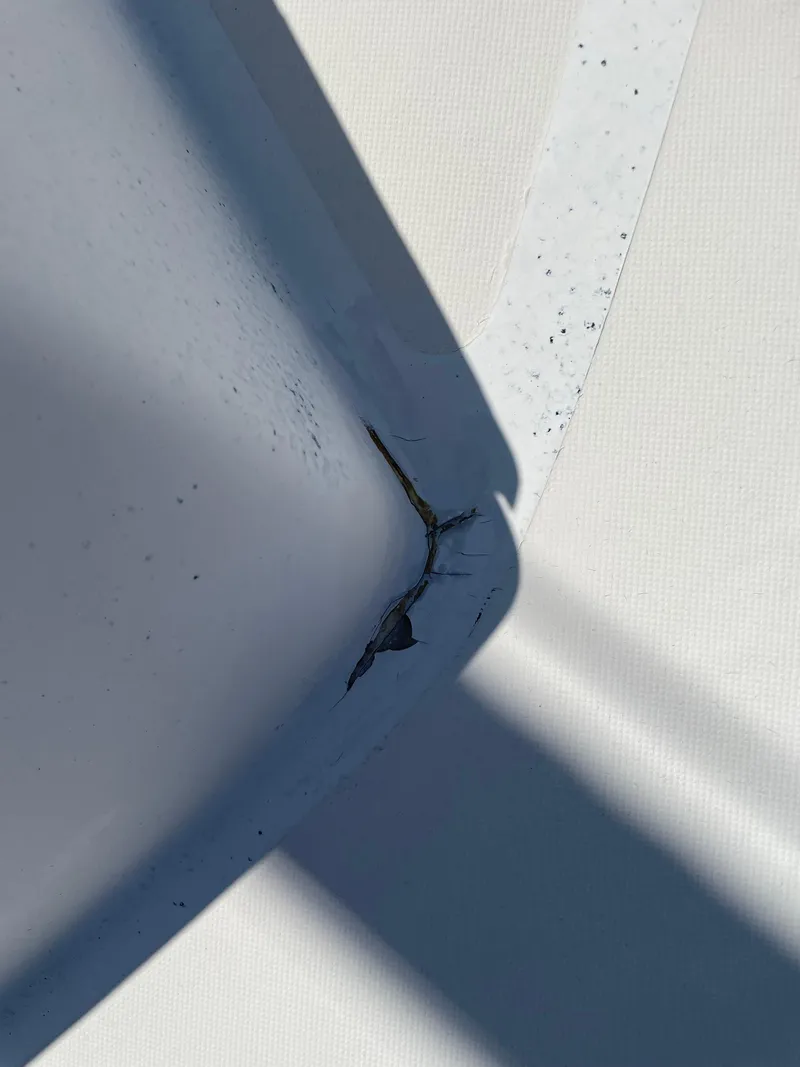 Slide: The Image of Close-up of a crack on a 1979 Bristol 32 surface. - 14