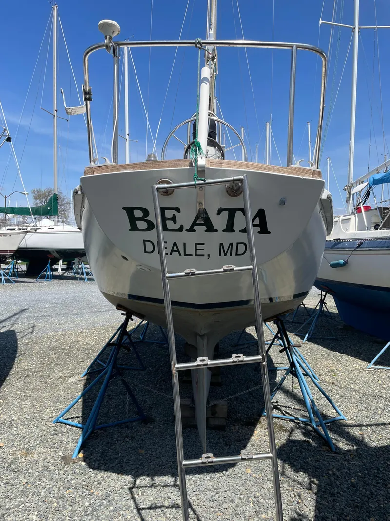 Slide: The Image of 1979 Bristol 32 sailboat named "Beata" on stands in a boatyard, Deale, MD. - 25