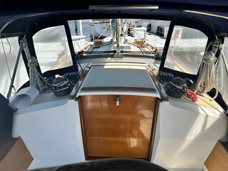 Slide: The Image of Cockpit view of 1988 Cape Dory 30 MK II sailboat with wooden hatch and winches. - 20