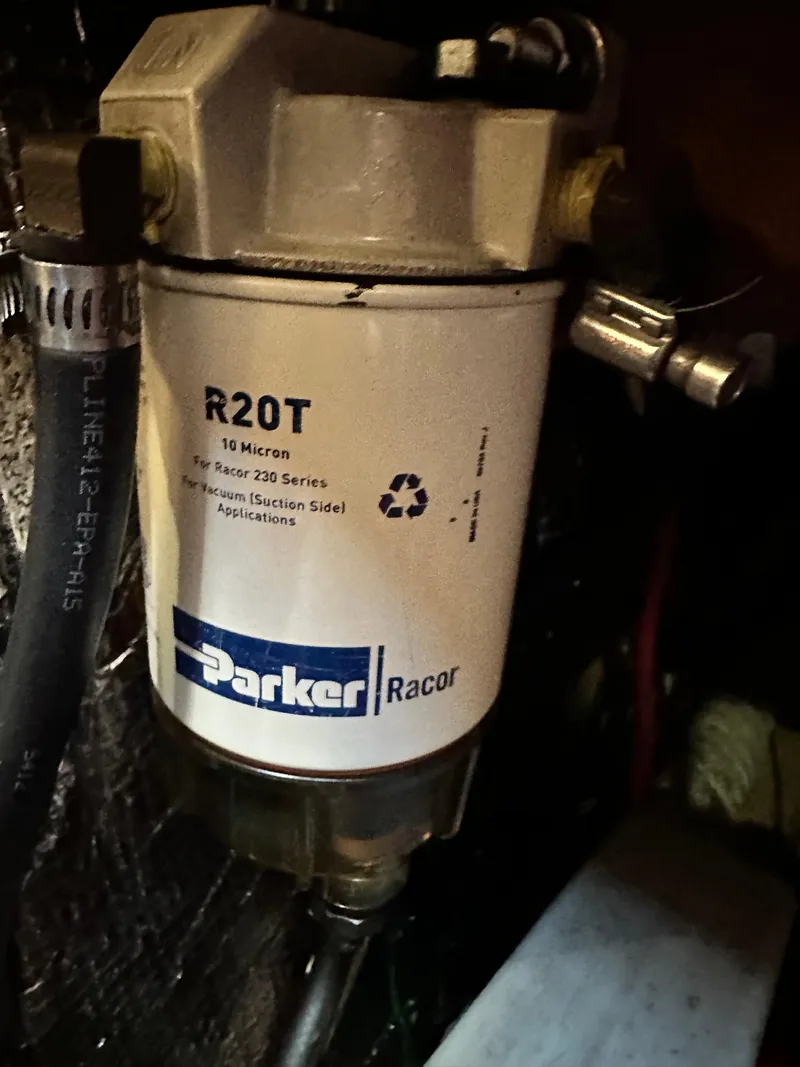 Slide: The Image of Fuel filter system in a 1988 Cape Dory 30 MK II sailboat engine compartment. - 43