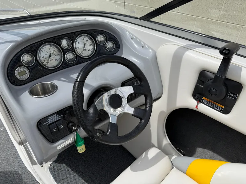 Slide: The Image of 2008 Reinell Bowrider 220LSE dashboard with steering wheel and instrument panel. - 29