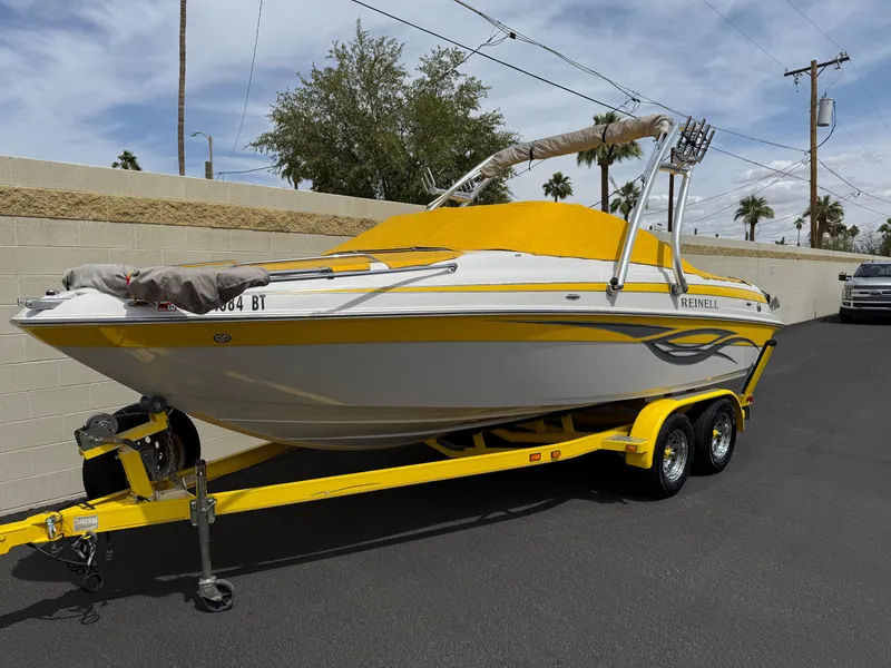 Slide: The Image of 2008 Reinell Bowrider 220LSE on yellow trailer, parked outdoors. - 34